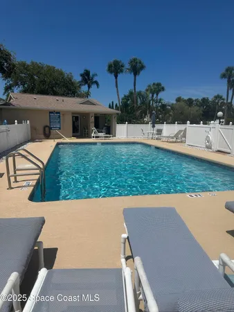 a view of a yard with an outdoor seating