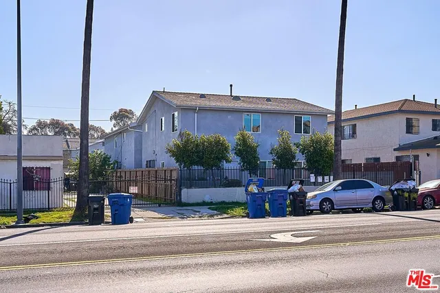 a view of a street with cars