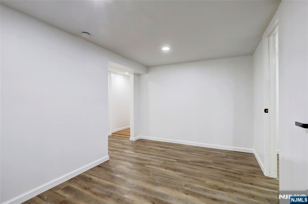 4-21 Saddle River Road, Unit 1 Fair Lawn, NJ 07410 - Photo 18 of 19 a view of room with wooden floor