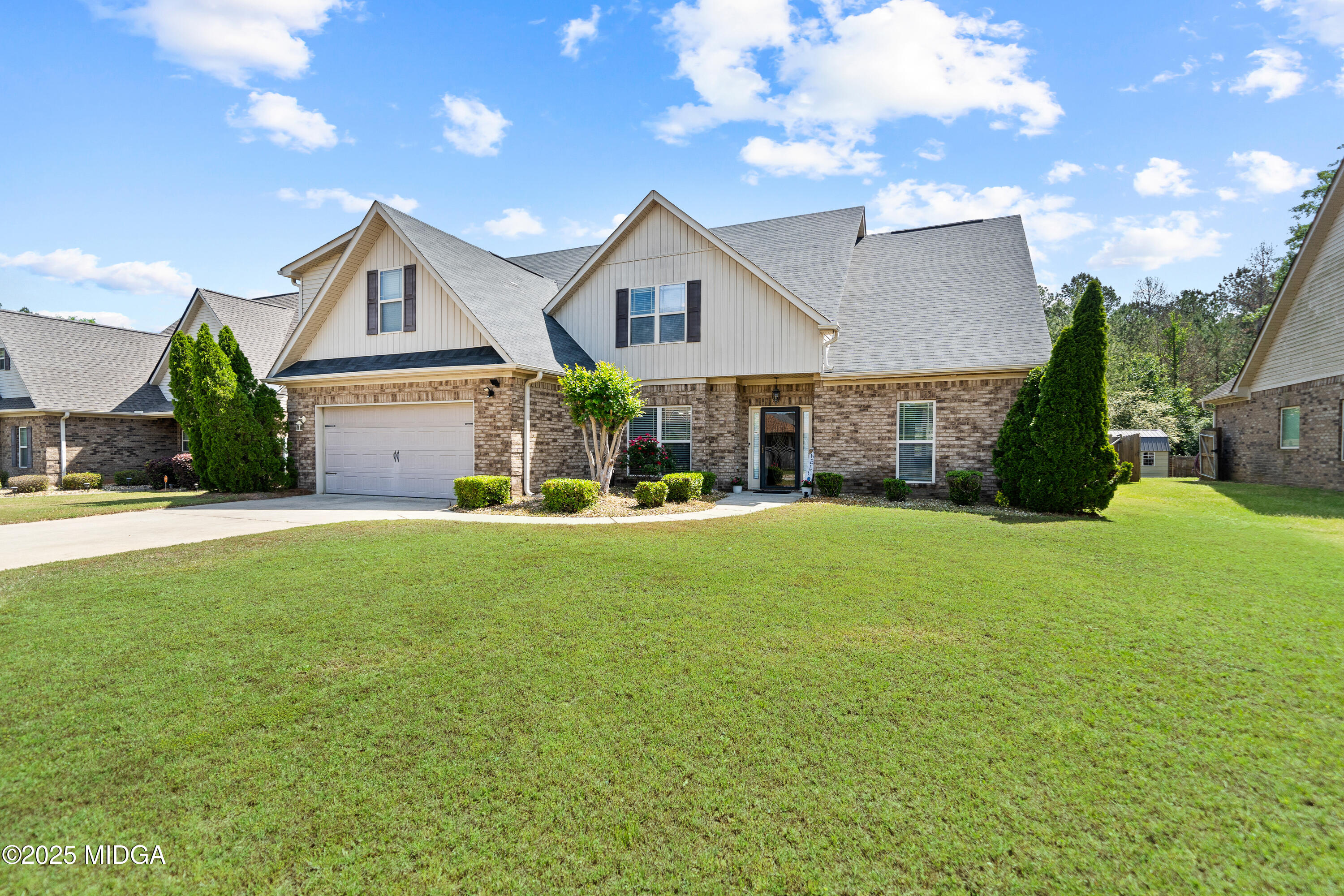 405 Stonecrest Court Macon, GA 31216 - Photo 1 of 45 a front view of house with yard and green space