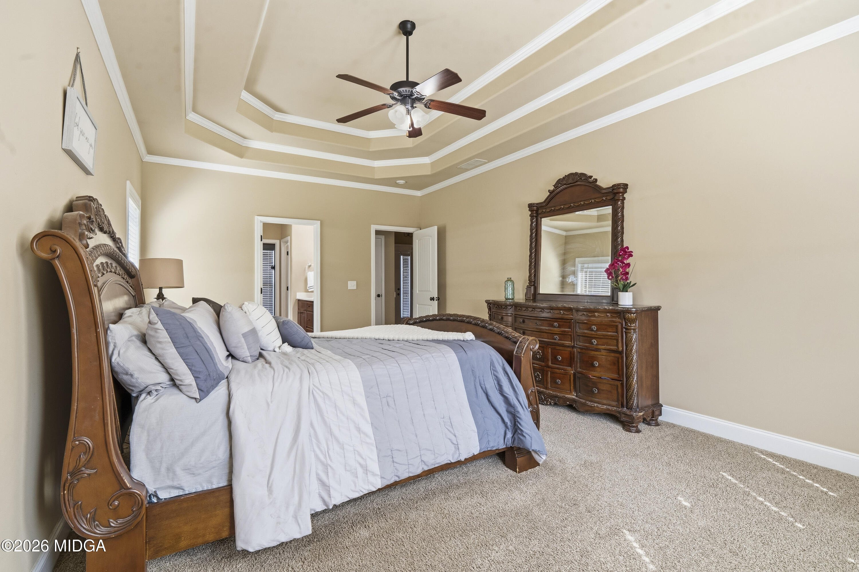 405 Stonecrest Court Macon, GA 31216 - Photo 25 of 45 a bedroom with bed and ceiling fan