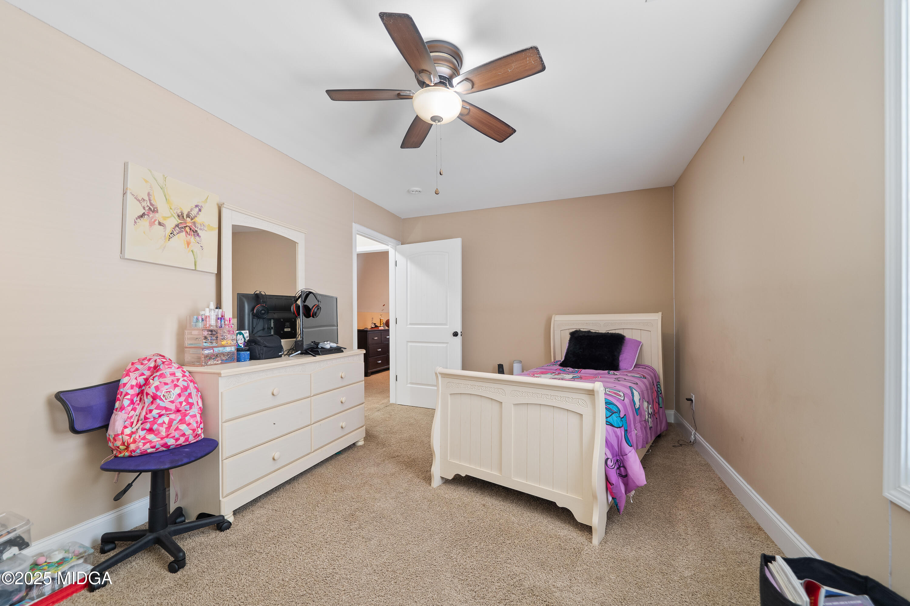405 Stonecrest Court Macon, GA 31216 - Photo 38 of 45 a room with a bed furniture and a window