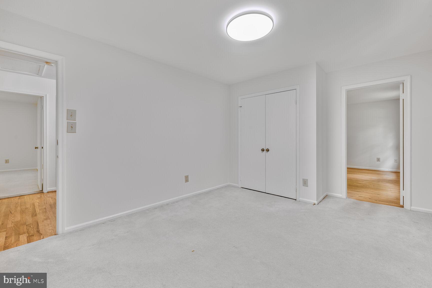 9605 Reach Road Potomac, MD 20854 - Photo 25 of 44 an empty room with an entryway