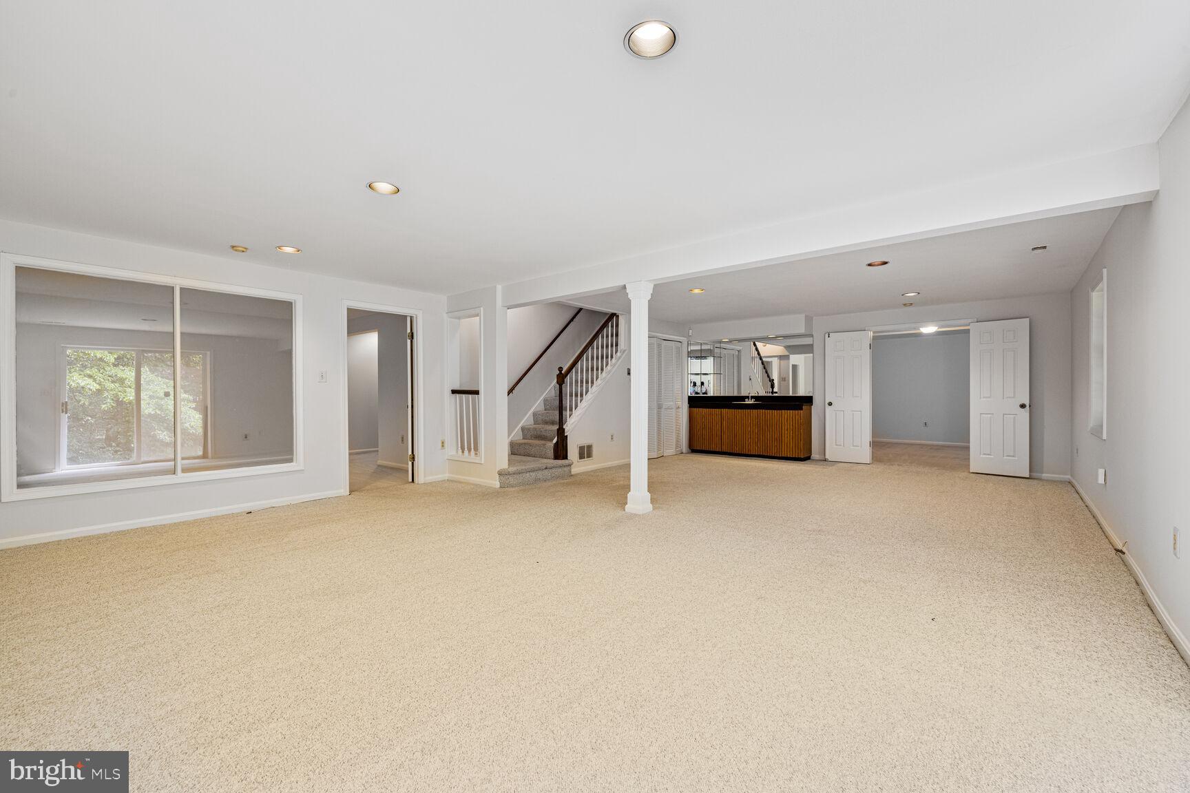 9605 Reach Road Potomac, MD 20854 - Photo 31 of 44 an empty room with a window and furniture