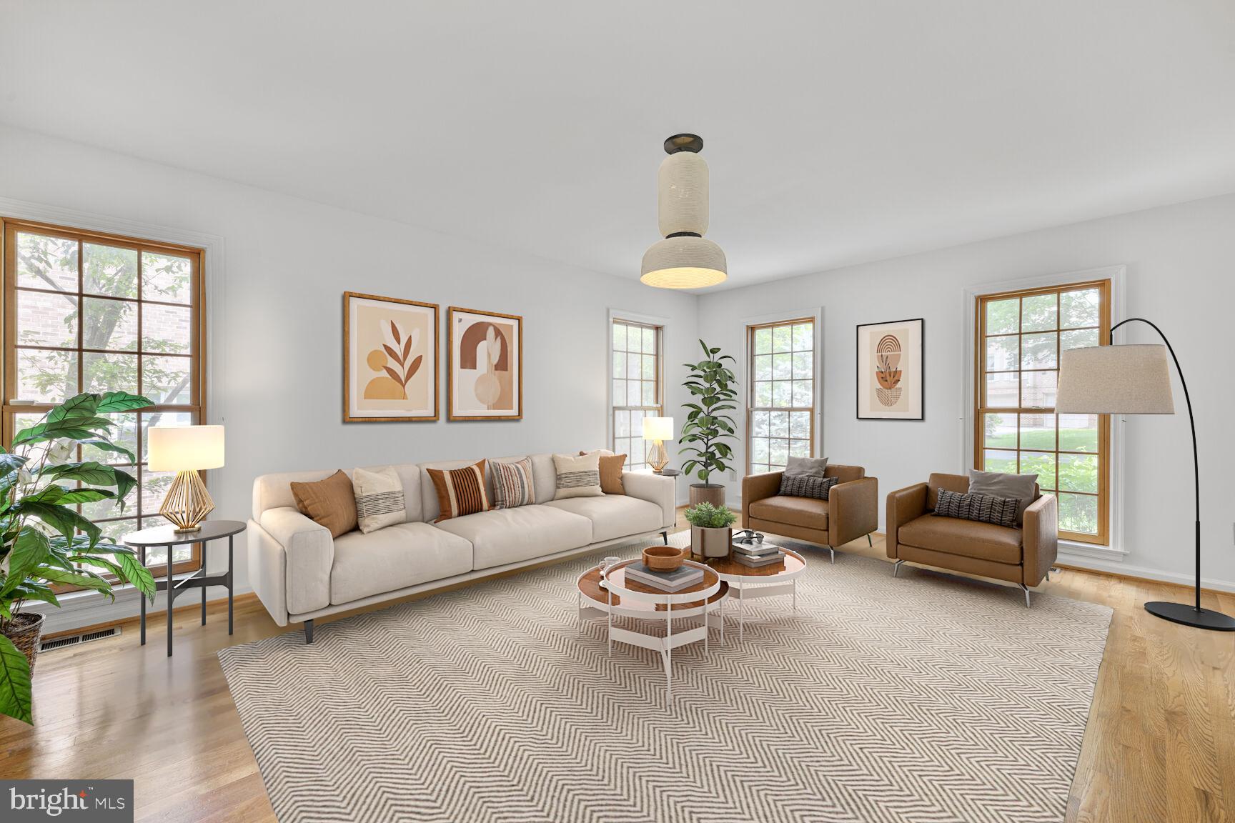 9605 Reach Road Potomac, MD 20854 - Photo 4 of 44 a living room with furniture and a large window