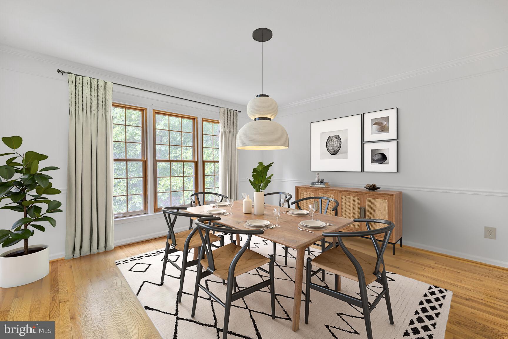 9605 Reach Road Potomac, MD 20854 - Photo 6 of 44 a view of a dining room with furniture window and wooden floor