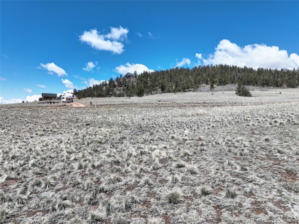 View of yard with a rural view