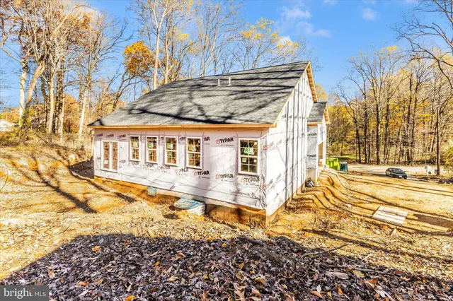 a view of a house with a snow on the yard