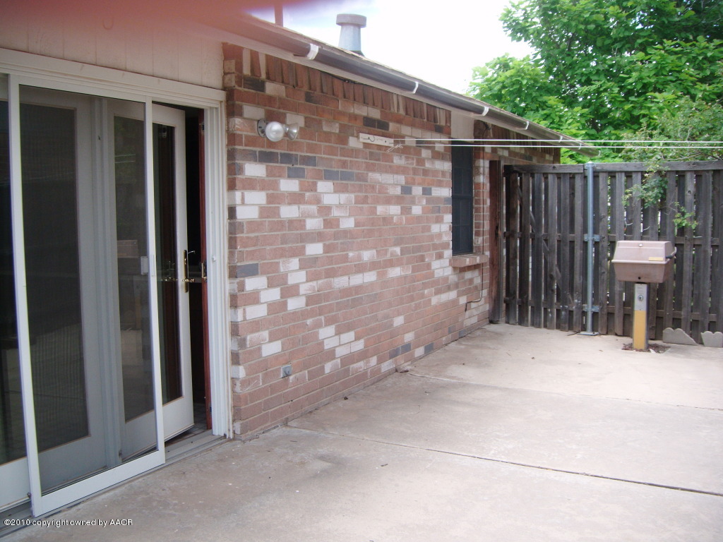 5105 Raindrop Lane Amarillo, TX 79110 - Photo 19 of 21 Side patio v2