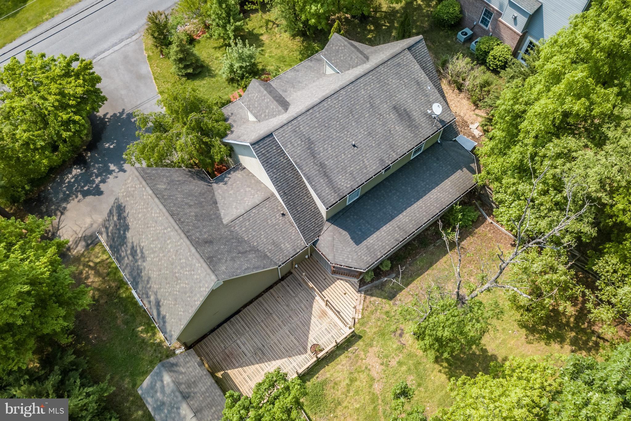 141 Holiday Road Cross Junction, VA 22625 - Photo 2 of 30 an aerial view of a house with a yard and potted plants