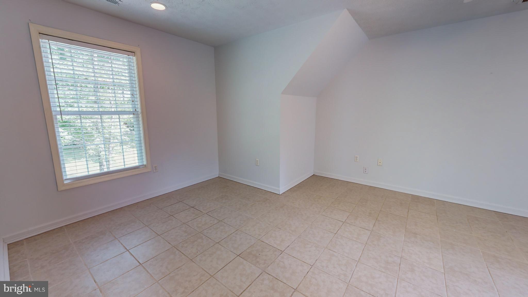 141 Holiday Road Cross Junction, VA 22625 - Photo 21 of 30 an empty room with a window