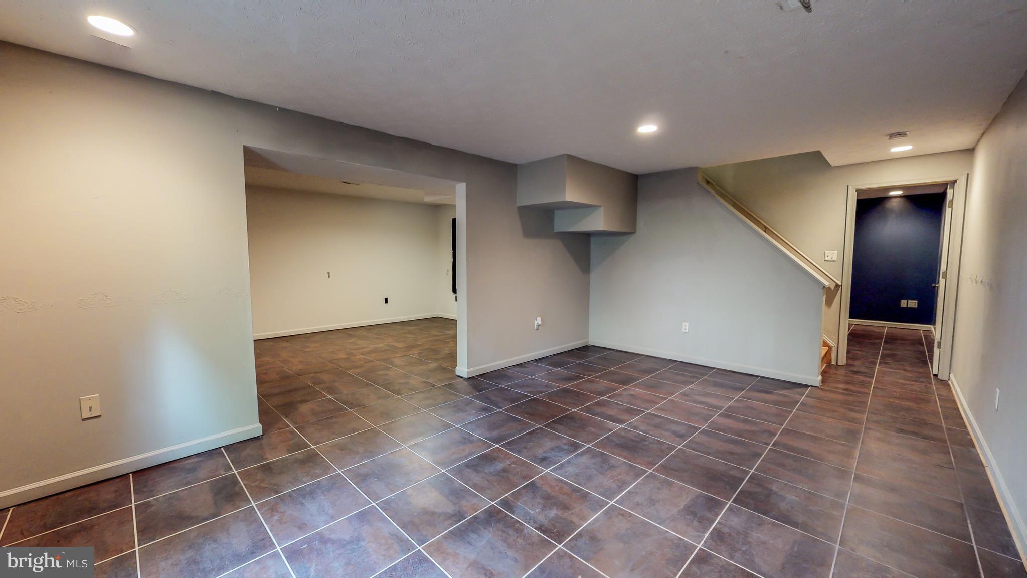141 Holiday Road Cross Junction, VA 22625 - Photo 23 of 30 an empty room with wooden floor and windows
