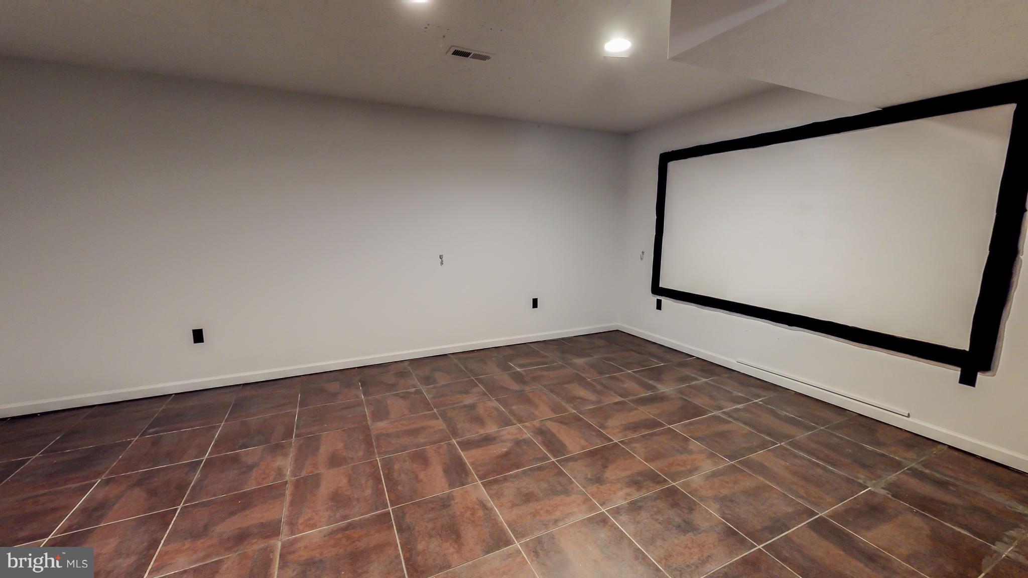 141 Holiday Road Cross Junction, VA 22625 - Photo 25 of 30 a view of a room with wooden floor and white walls
