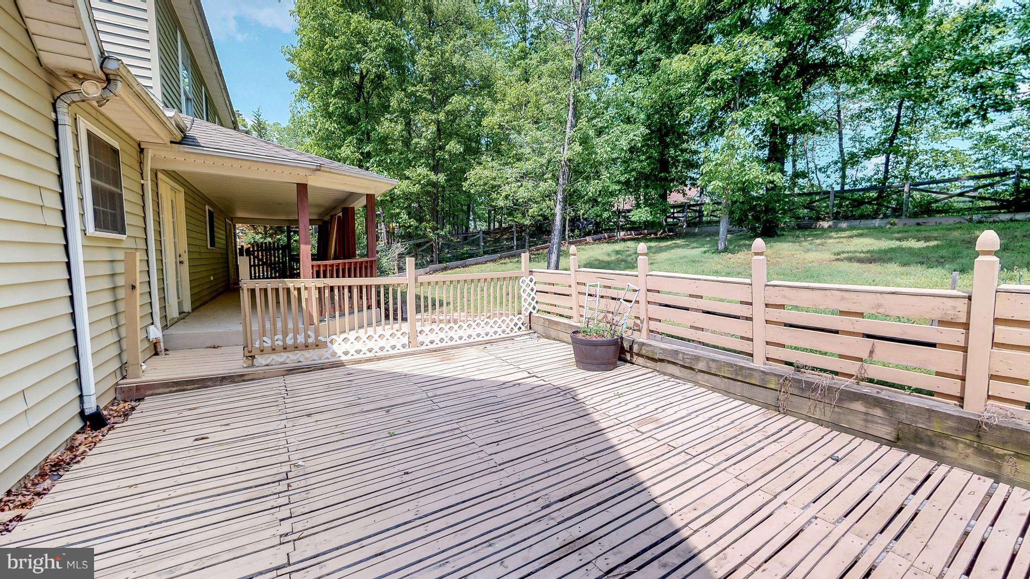 141 Holiday Road Cross Junction, VA 22625 - Photo 30 of 30 a view of a house with a deck