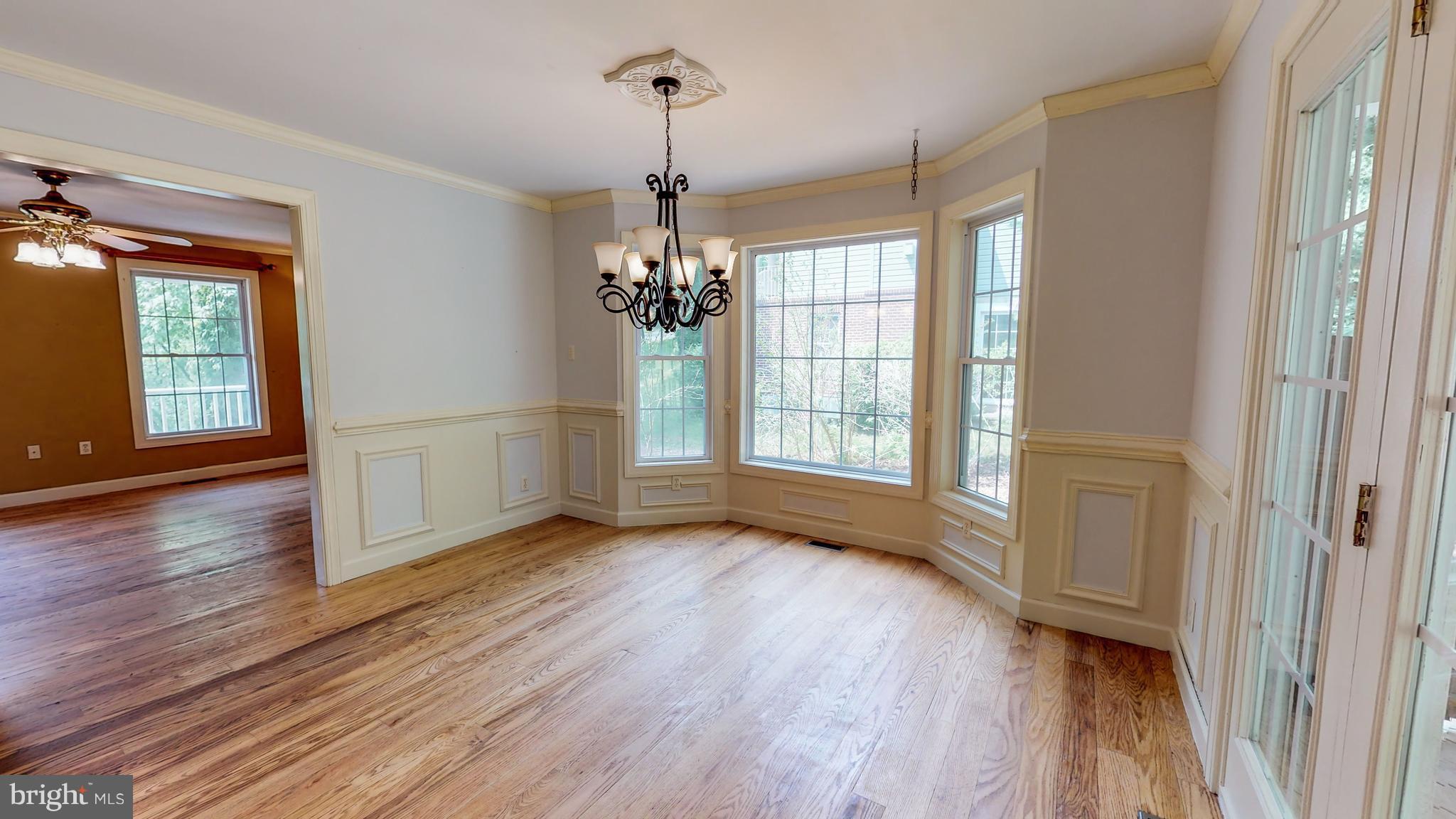 141 Holiday Road Cross Junction, VA 22625 - Photo 9 of 30 a view of livingroom with hardwood floor and window