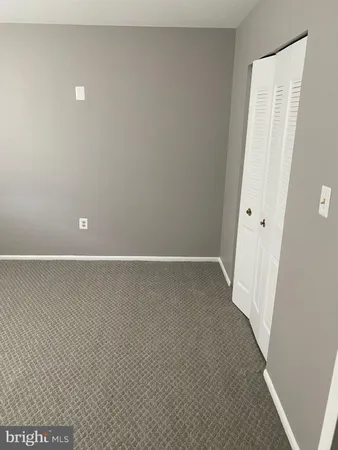 a view of small space with wooden floor