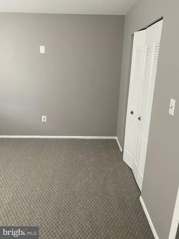 a view of small space with wooden floor