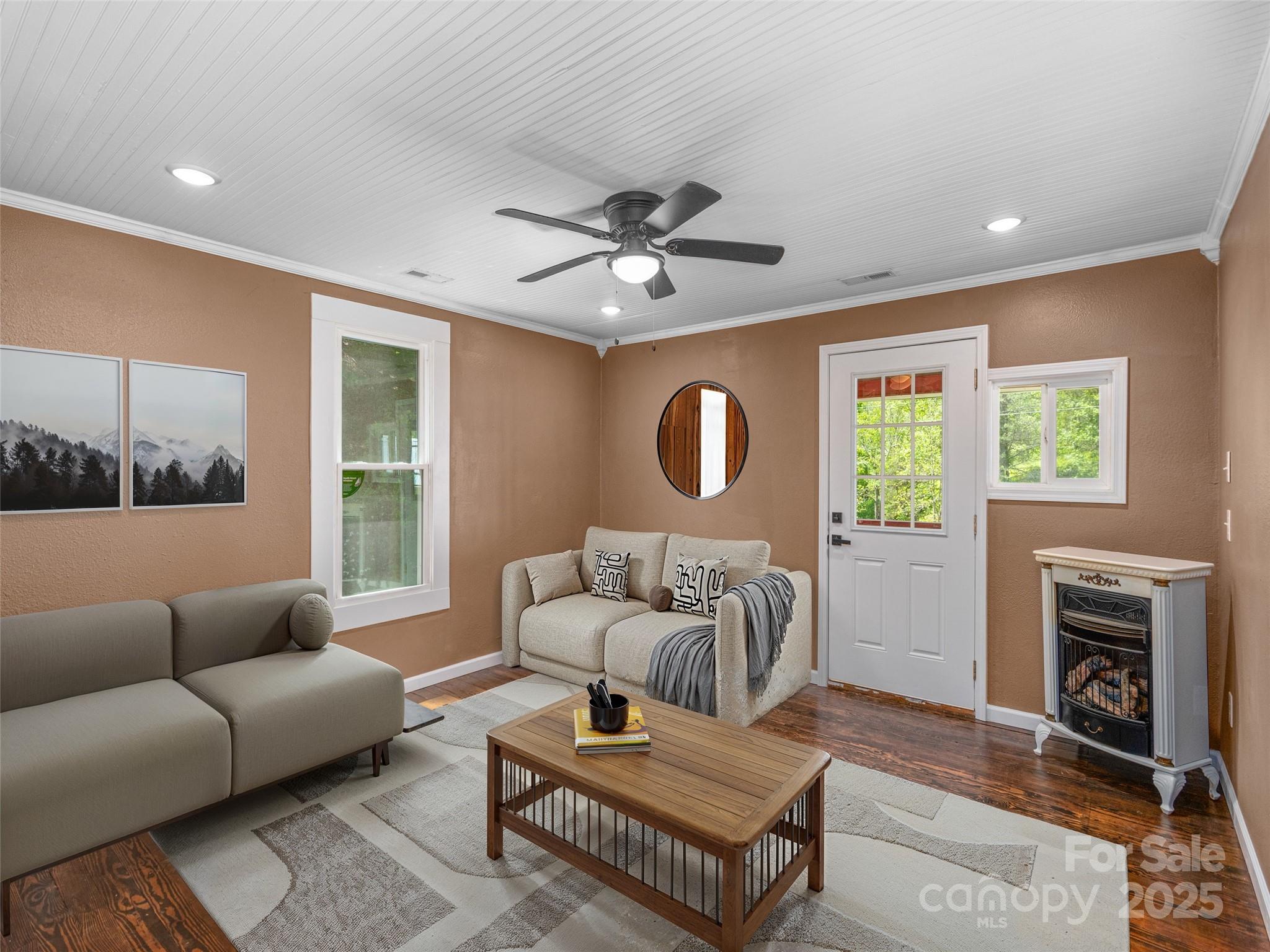 280 Noland Drive Clyde, NC 28721 - Photo 4 of 32 a living room with furniture and a large window