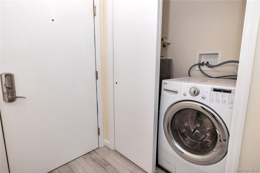 68 Lake Street, Unit 108 White Plains, NY 10601 - Photo 22 of 36 a utility room with dryer and washer