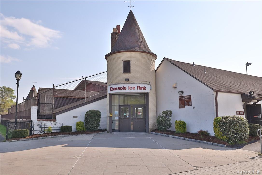 68 Lake Street, Unit 108 White Plains, NY 10601 - Photo 32 of 36 a front view of a house with garden