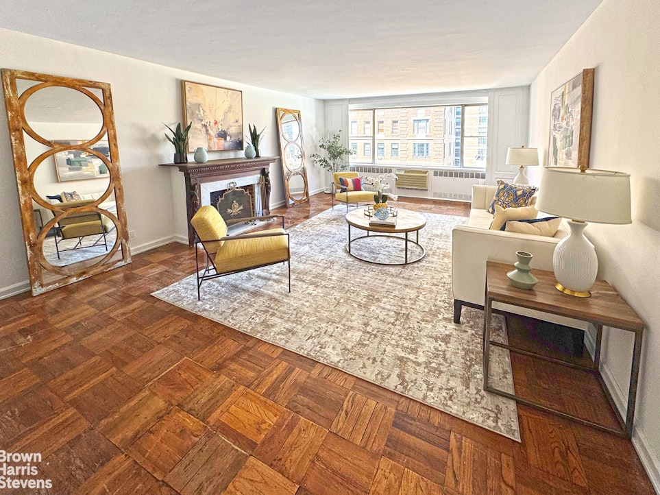 a living room with furniture and a window