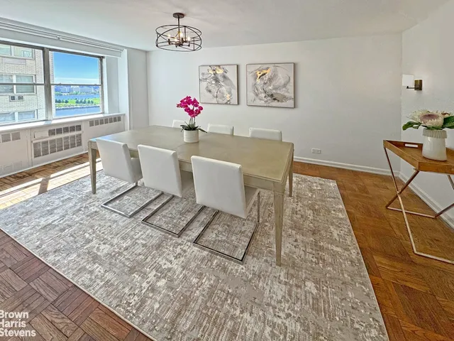 a spacious bedroom with a bed and window