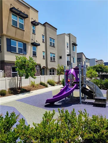 front view of a building with a yard