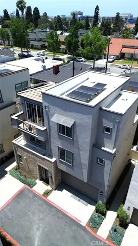 a view of a patio with a table and chairs