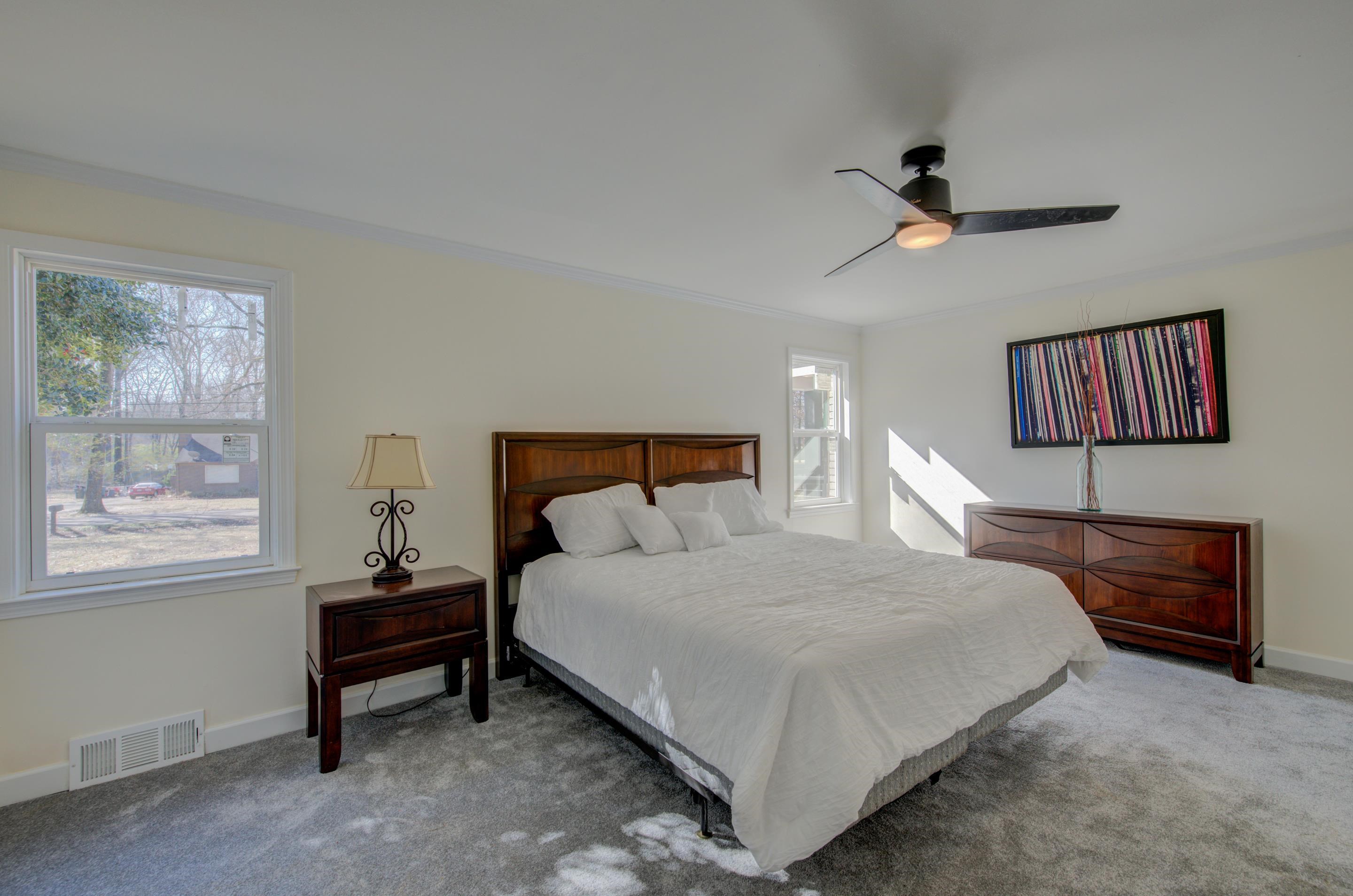 7250 Cedar Road Bartlett, TN 38135 - Photo 16 of 25 a bedroom with a bed wall painting and a window