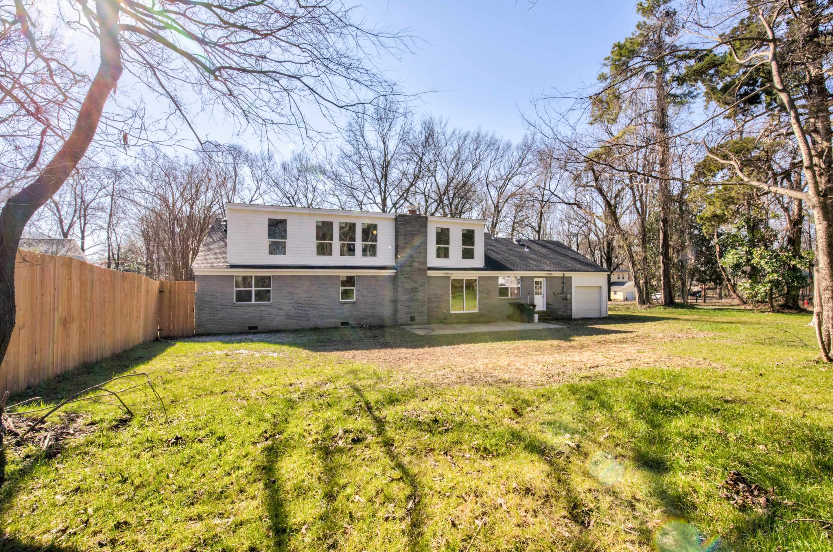 7250 Cedar Road Bartlett, TN 38135 - Photo 24 of 25 a front view of house with yard and trees around