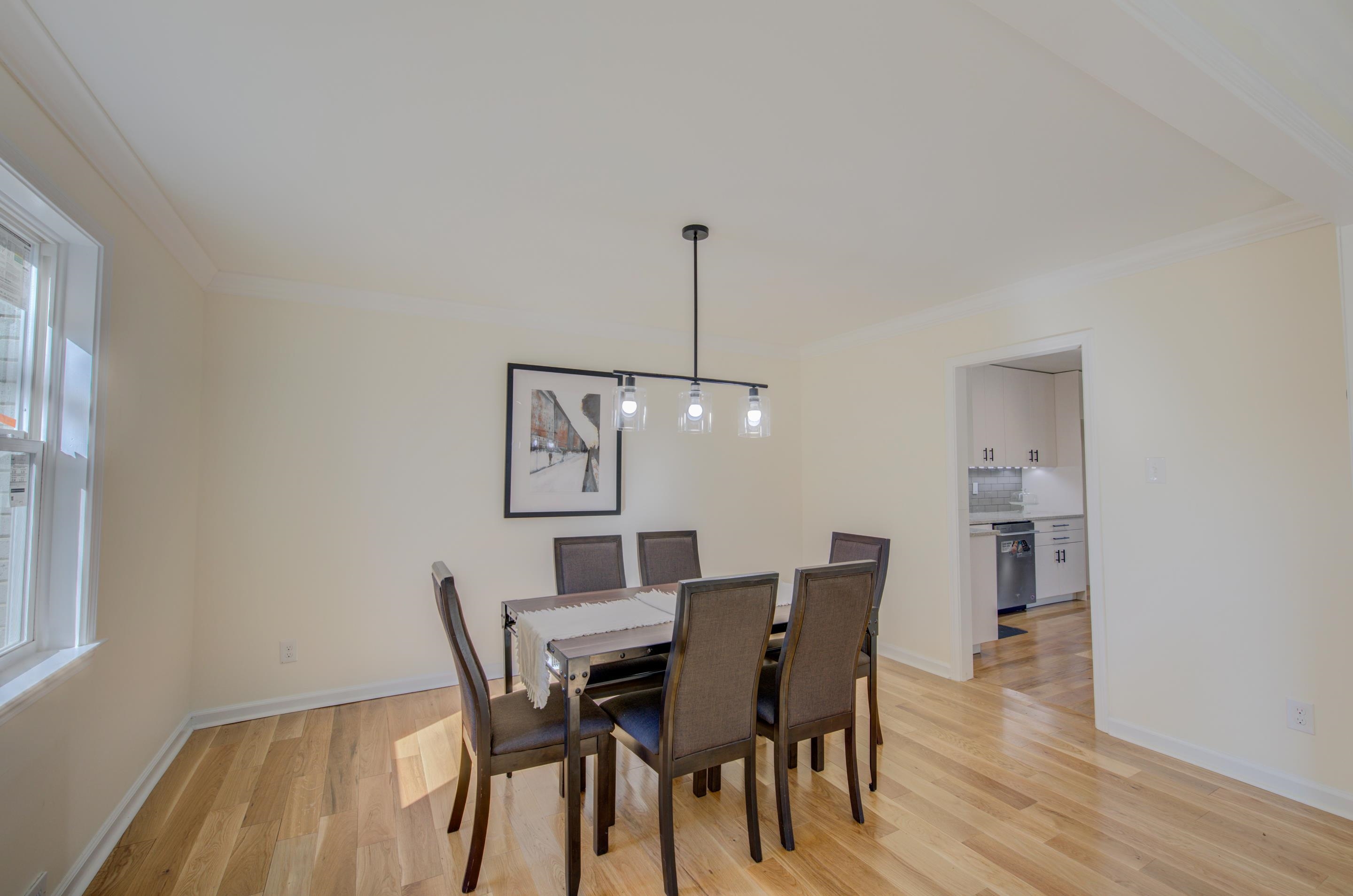 7250 Cedar Road Bartlett, TN 38135 - Photo 6 of 25 a view of a dining room with furniture and wooden floor