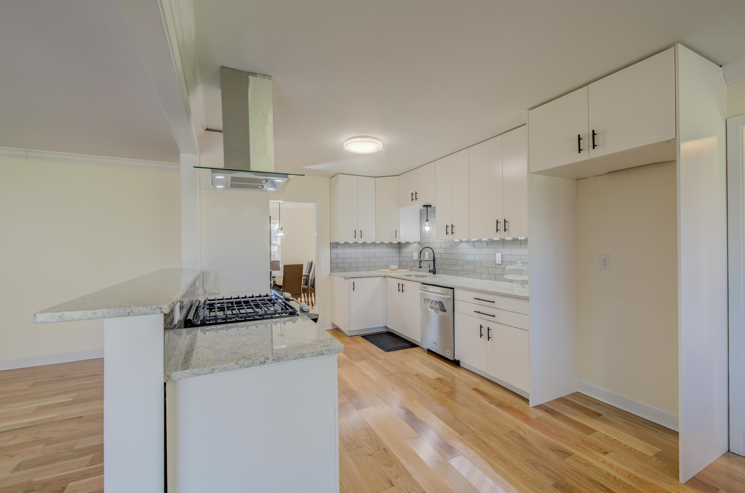 7250 Cedar Road Bartlett, TN 38135 - Photo 8 of 25 a kitchen with a stove cabinets and a refrigerator