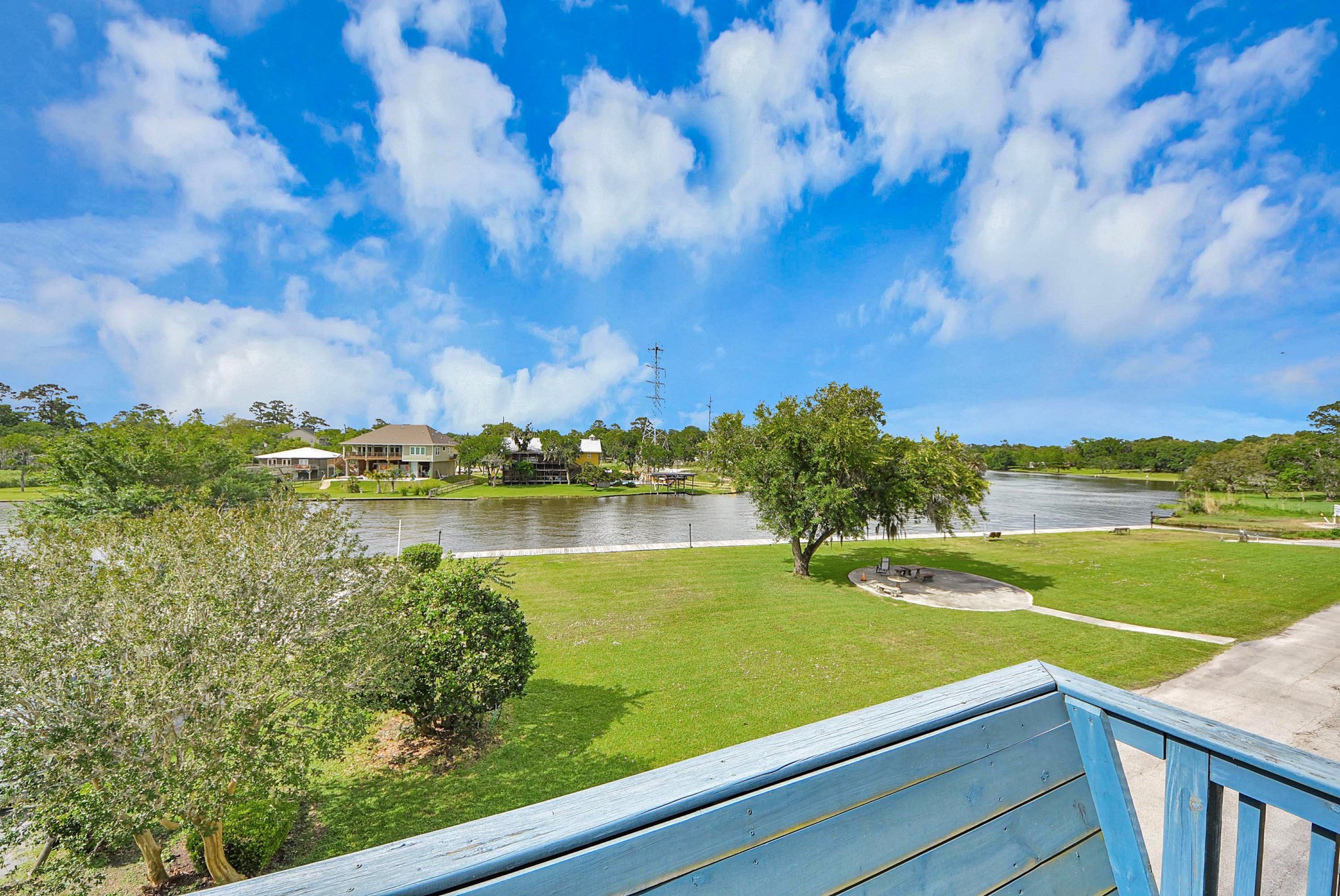 2117 Casa Rio Circle Dickinson, TX 77539 - Photo 2 of 23 a view of a lake with a yard
