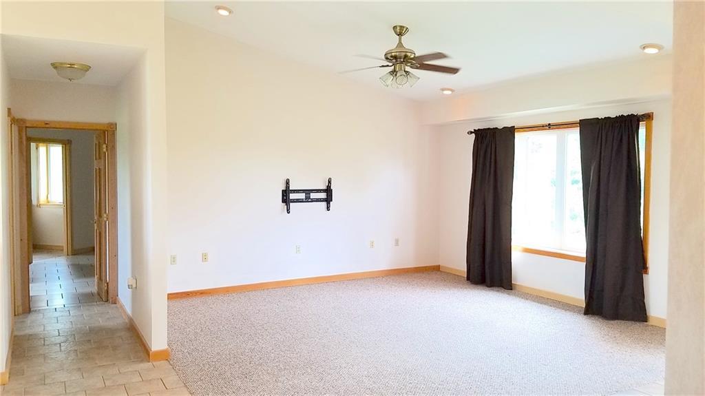 2269 Chapman Road Mapleton, ME 04757 - Photo 4 of 35 Living room and hallway to the...