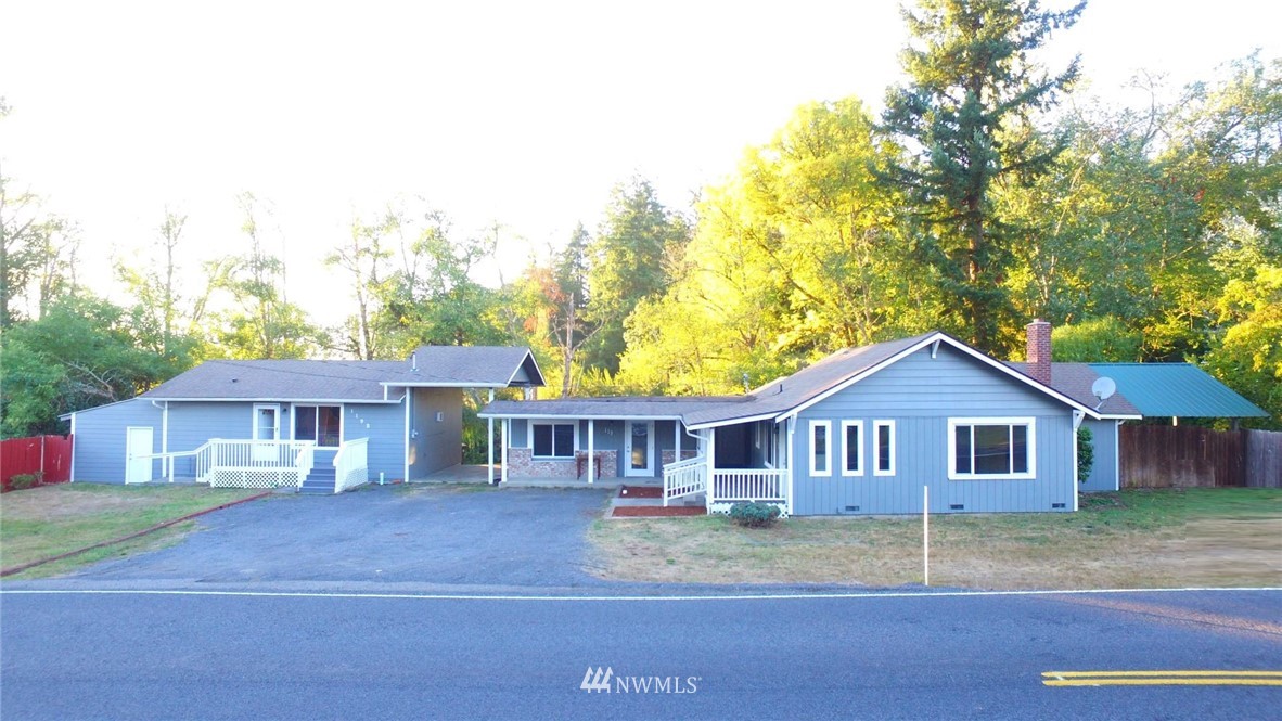 119 Logan Hill Road Chehalis, WA 98532 - Photo 6 of 40 a front of a house with a yard