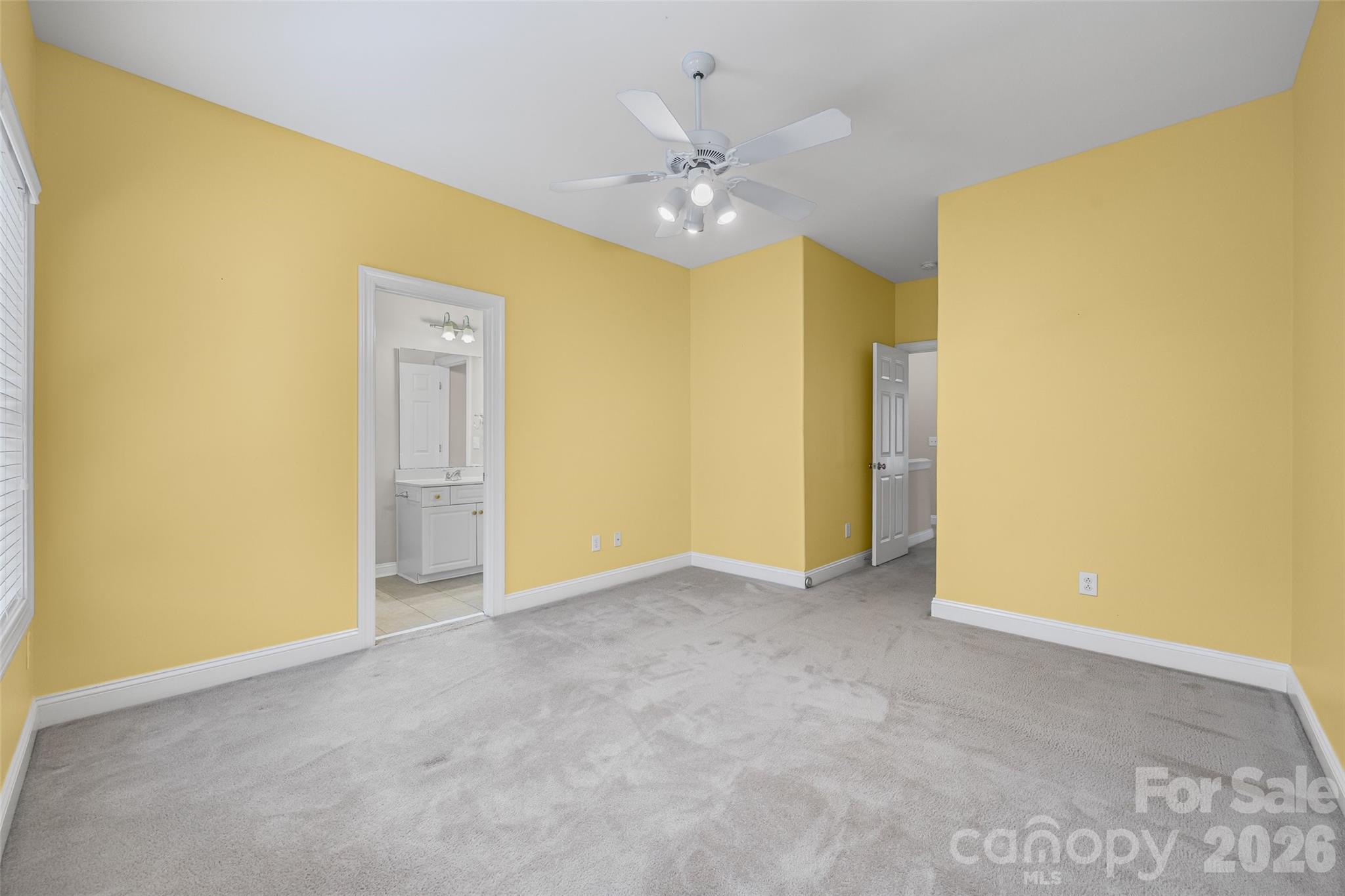 1576 Abercorn Street Northwest Concord, NC 28027 - Photo 38 of 48 a view of an empty room with a chandelier fan