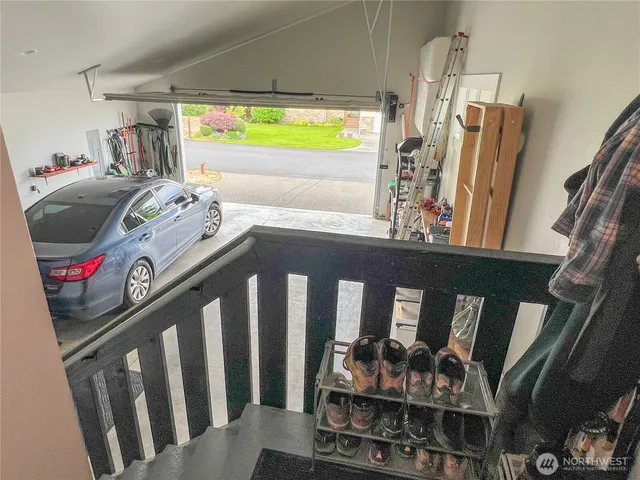 a view of front door with furniture and toys
