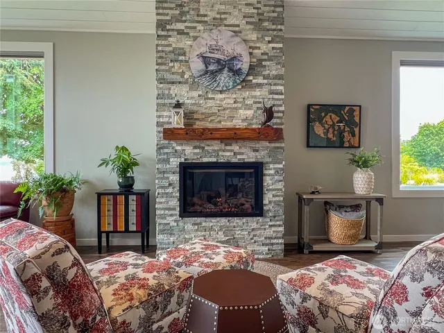 a bedroom with a bed and a fireplace