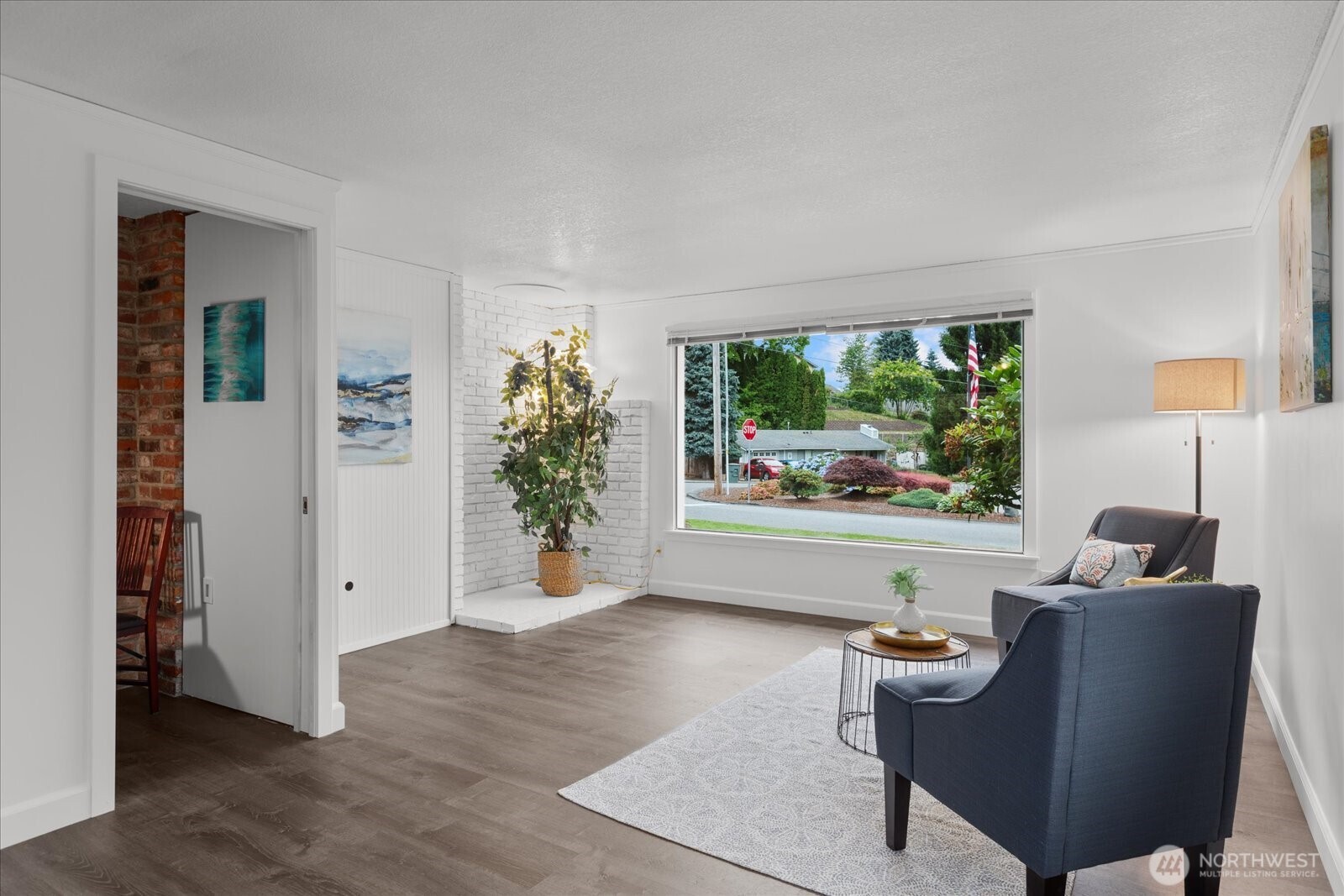 1202 44th Street Southeast Everett, WA 98203 - Photo 3 of 38 a living room with furniture and a large window