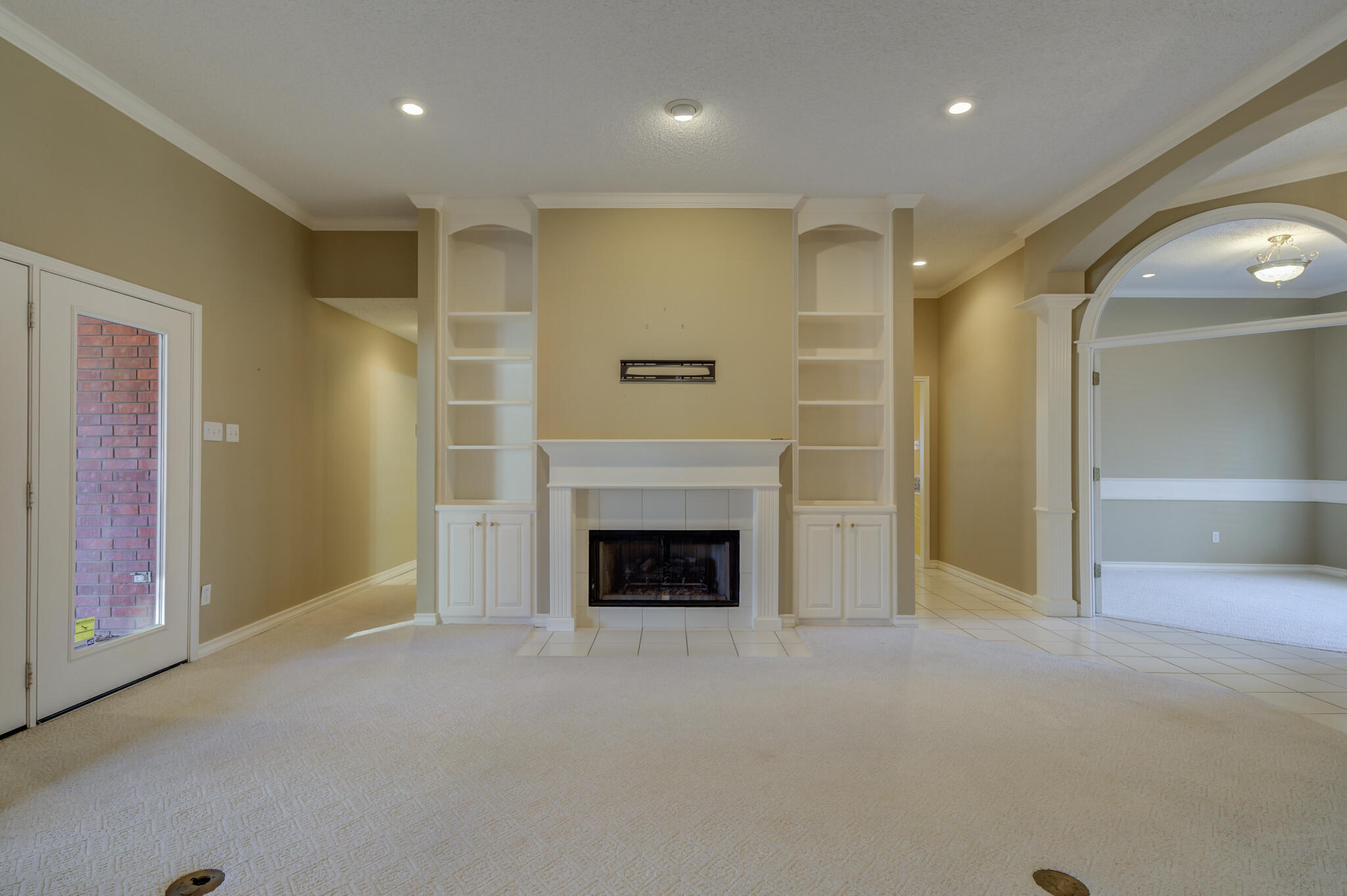 5917 85th Street Lubbock, TX 79424 - Photo 11 of 51 a view of a livingroom with a fireplace