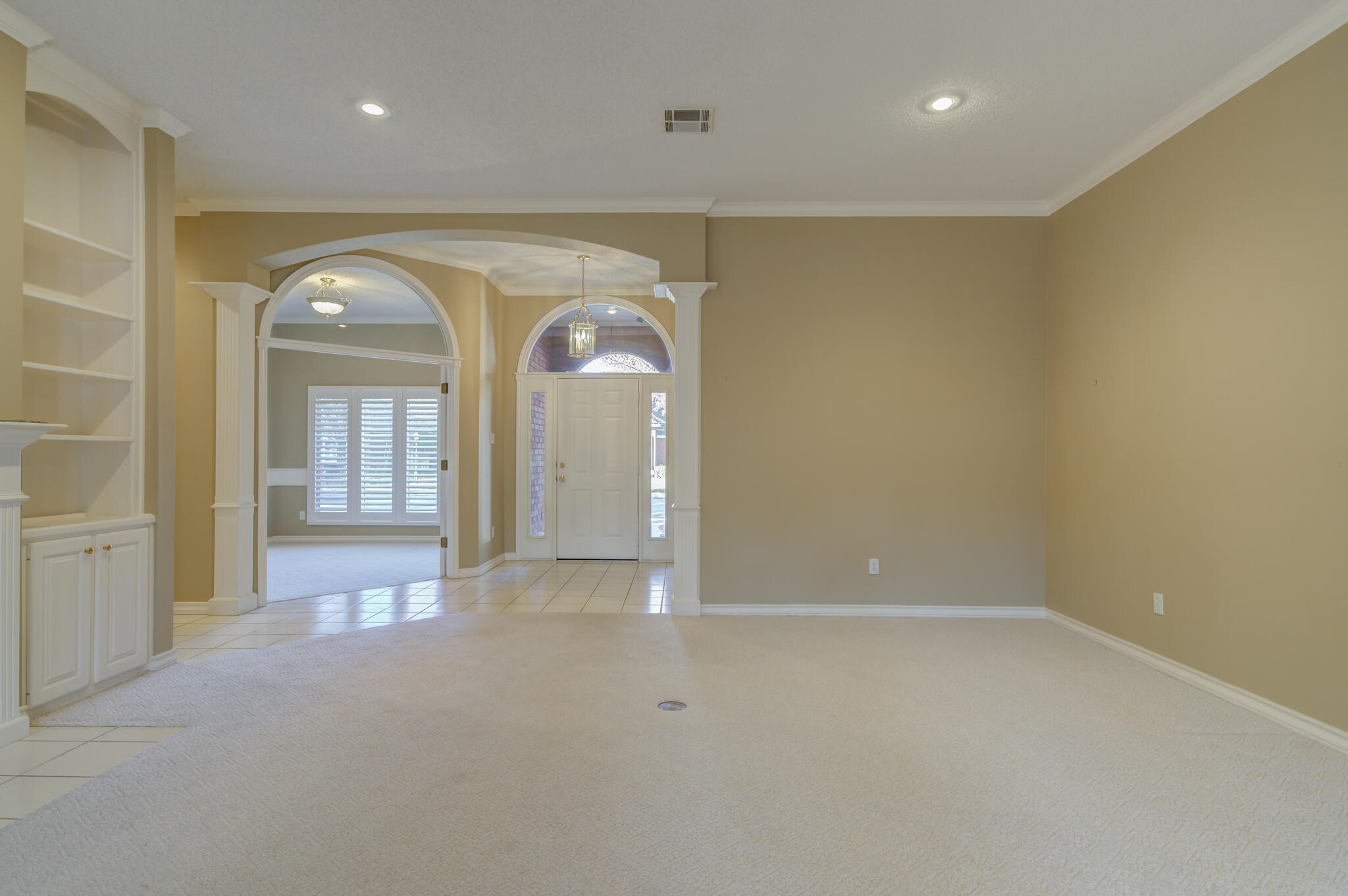 5917 85th Street Lubbock, TX 79424 - Photo 13 of 51 wooden floor in a room with a mirror