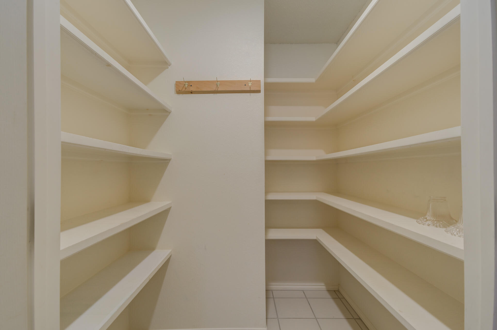 5917 85th Street Lubbock, TX 79424 - Photo 26 of 51 a view of an empty walk in closet