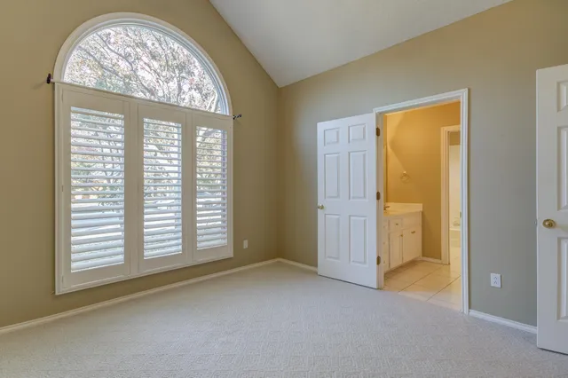 a bathroom with a toilet and a bathtub
