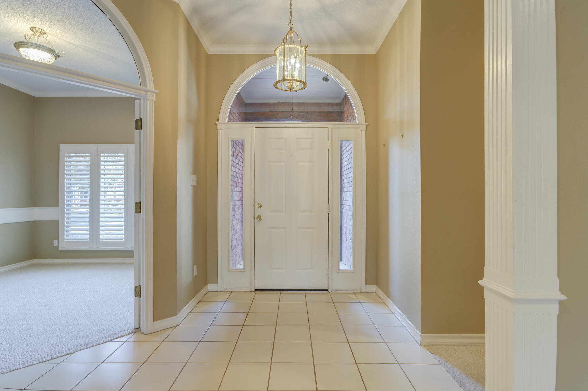 5917 85th Street Lubbock, TX 79424 - Photo 4 of 51 a view of a hallway to rooms