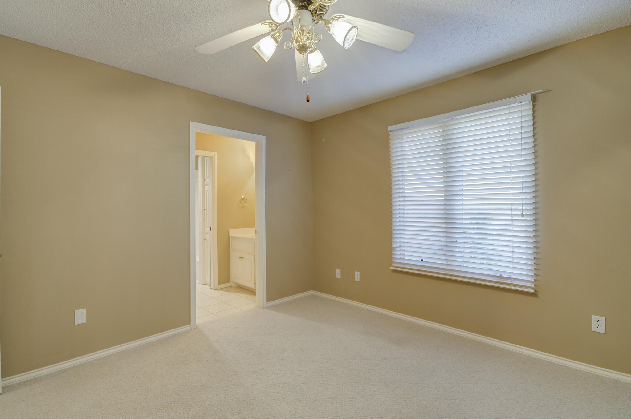 5917 85th Street Lubbock, TX 79424 - Photo 43 of 51 a view of an empty room with a window