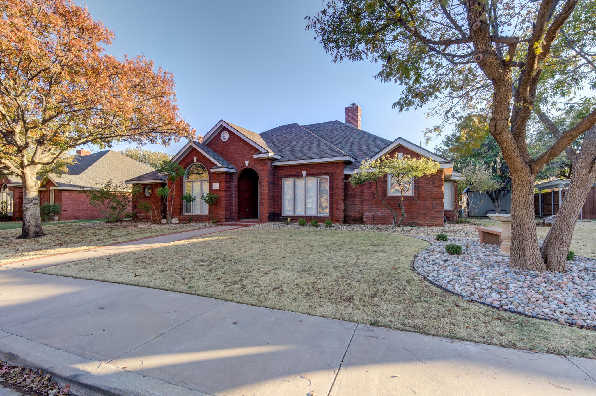5917 85th Street Lubbock, TX 79424 - Photo 51 of 51 a front view of a house with a yard