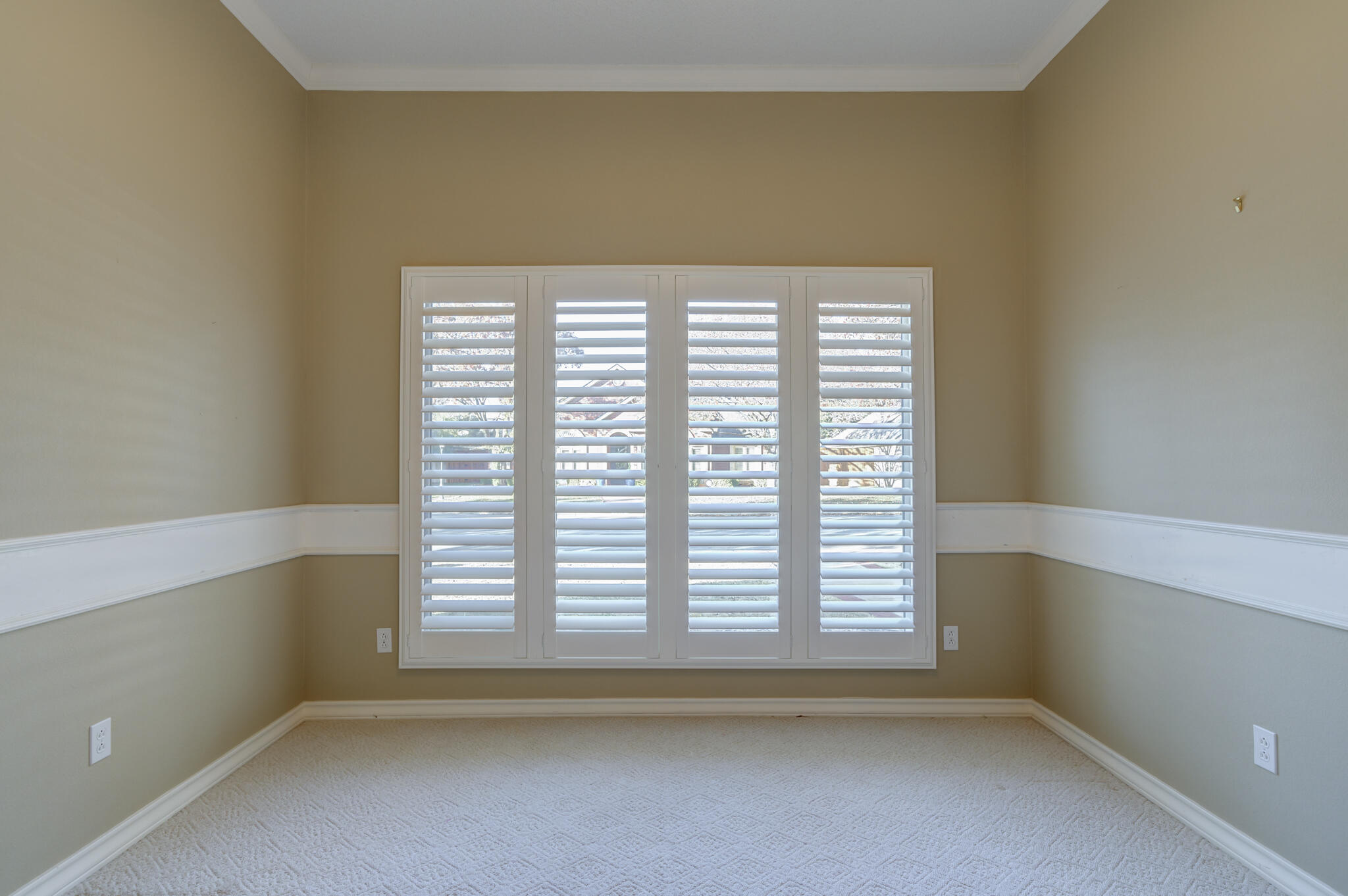 5917 85th Street Lubbock, TX 79424 - Photo 7 of 51 an empty room with a window