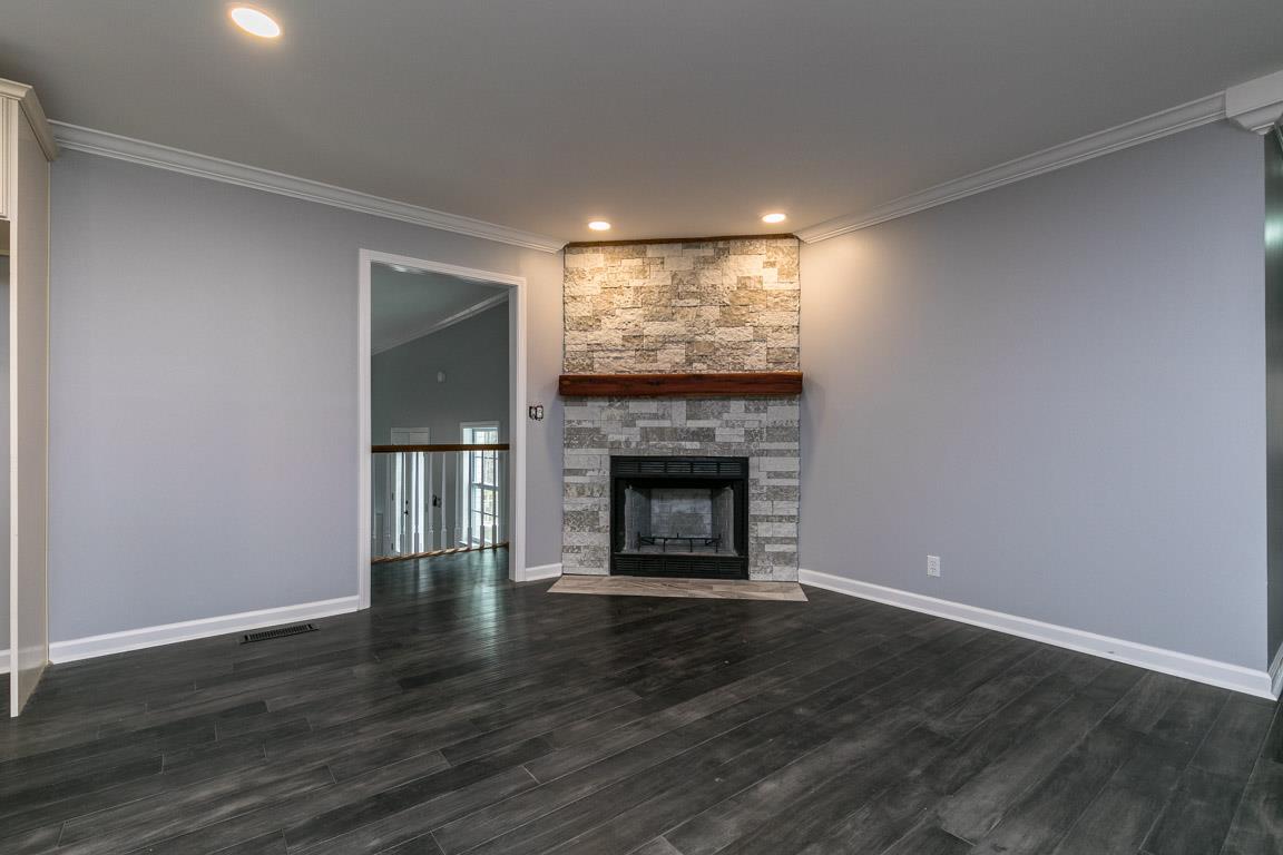 8914 Griffith Road Nashville, TN 37221 - Photo 9 of 22 Stacked Stone wood Burning Fireplace