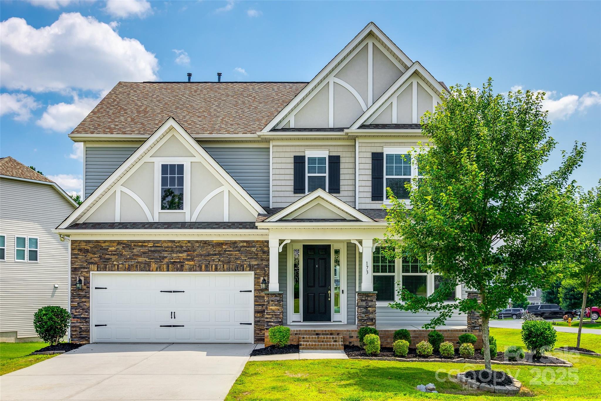 173 Morgan's Branch Road Belmont, NC 28012 - Photo 1 of 29 a front view of a house with garden