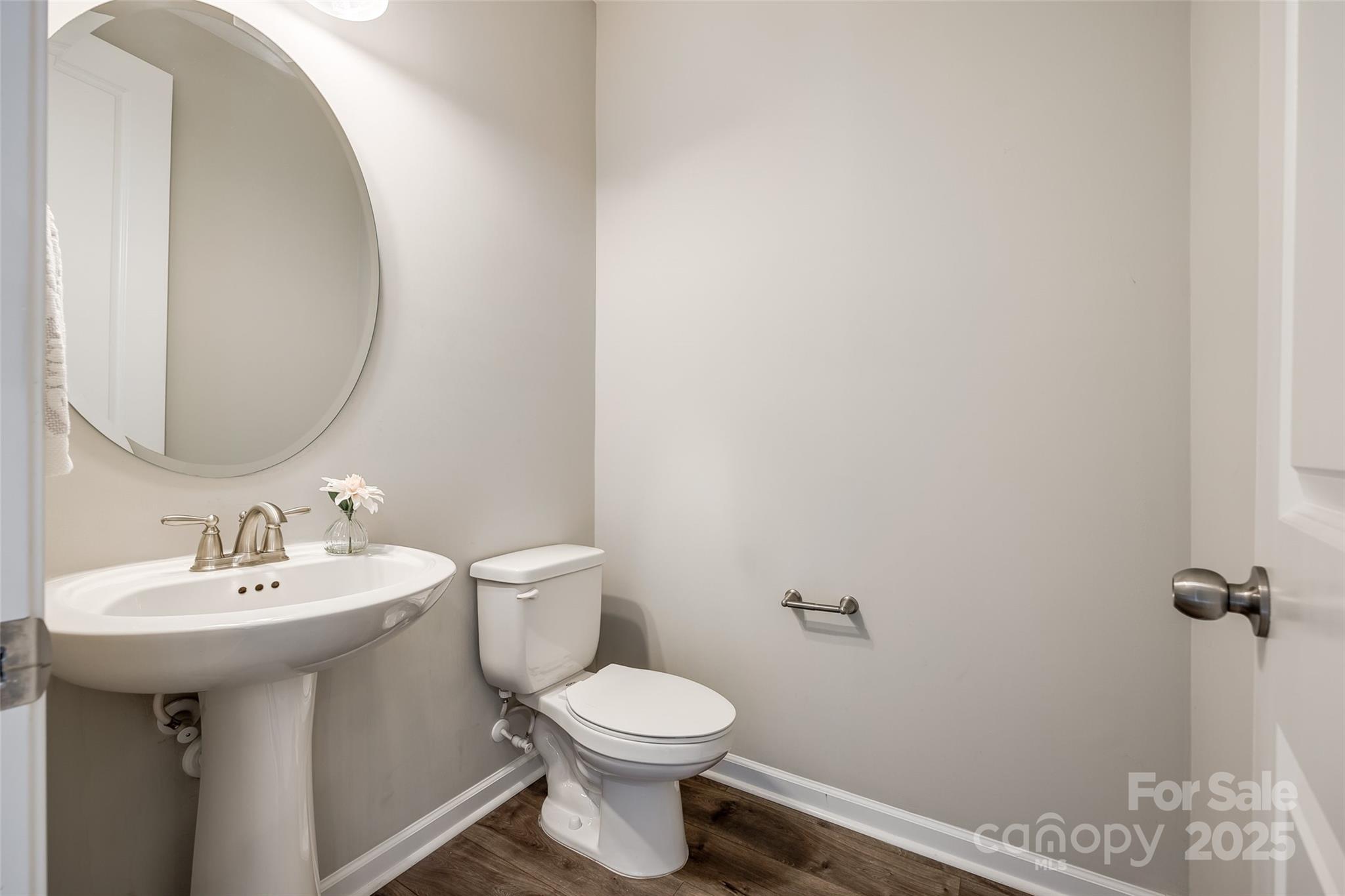 173 Morgan's Branch Road Belmont, NC 28012 - Photo 17 of 29 a bathroom with a sink toilet and mirror